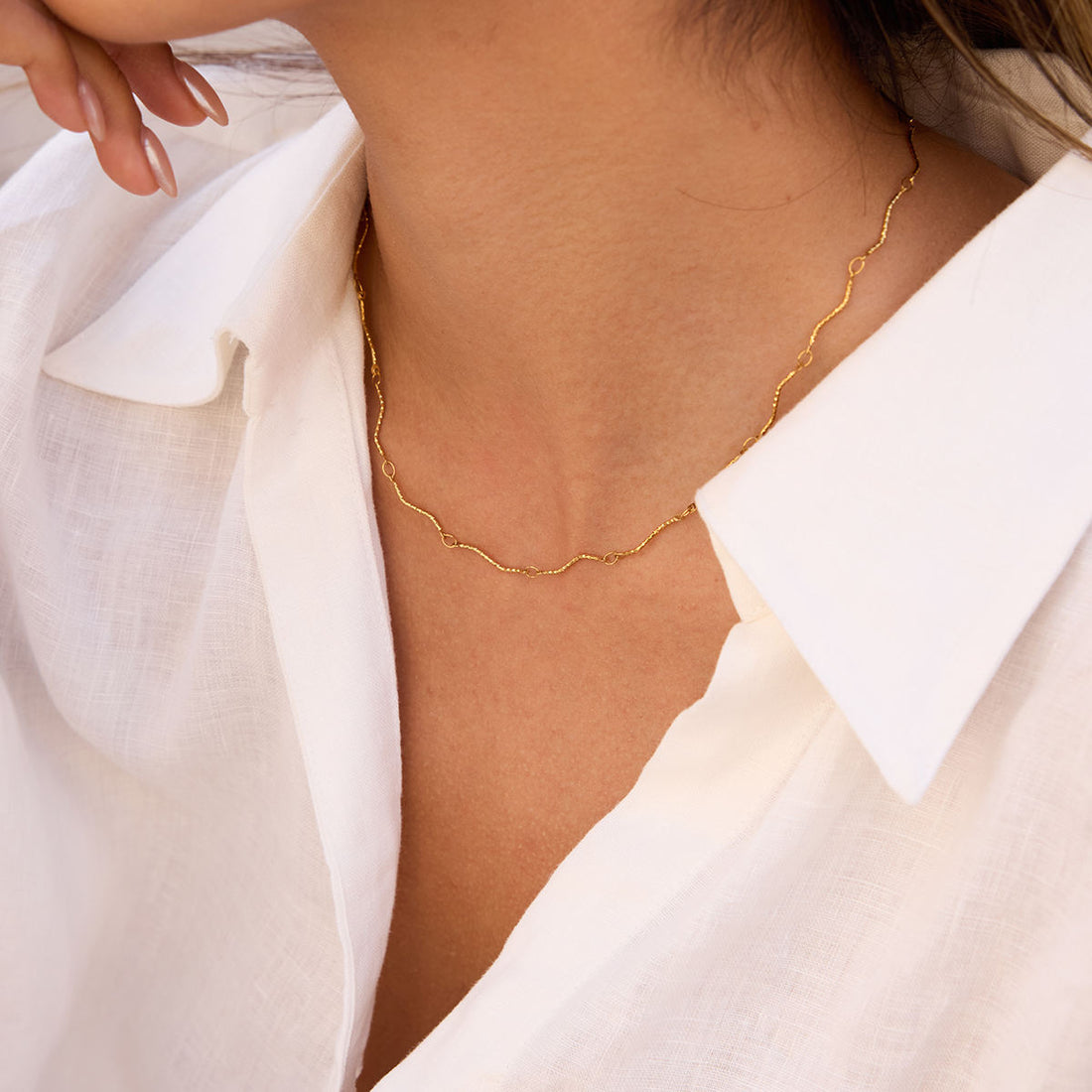 Sina, collier or chaine vague