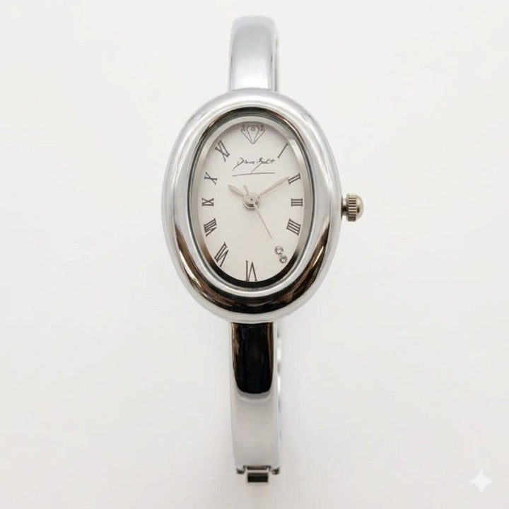 Montre rétro ovale finit argent acier ino9xydable